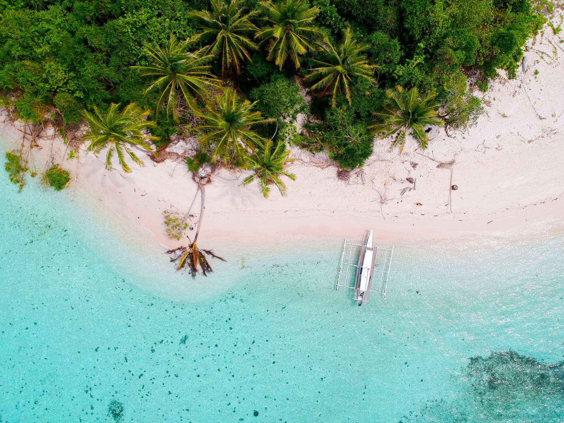 Bird's-eye photography of Boat on Island in the Philippines